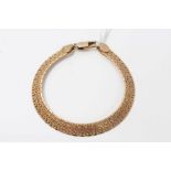 Gold (9ct) articulated bracelet,