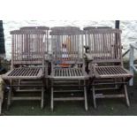 A set of six teak folding garden chairs with slatted backs - four plus two carvers