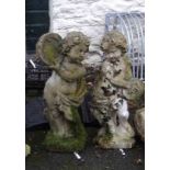 A pair of 28" pre-cast garden statues of putti, one playing a tambourine, the other cymbals