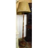A 20th Century chinoiserie style painted wood Standard lamp with stitched hide effect shade