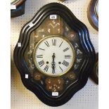 A 19th Century French Alsace style wall clock with ebonised reeded serpentine front, mother-of-pearl