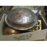 A box of collectable metalwork, including brass pan stand, copper quart jack, coppered pans, etc.