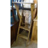 A vintage oak framed tennis umpire's ladder/seat