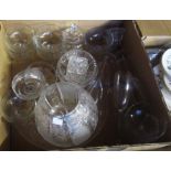 A box containing a quantity of glassware, including cut glass bowl, lidded jars, sundae dishes,