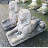 A pair of 30" concrete garden ornaments in the form of a Sphinx