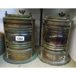 A pair of early 20th Century George Bocock & Co. Seahorse copper ship's port and starboard lanterns