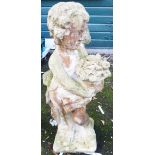 A 31" pre-cast statue of a putto with a bouquet of flowers