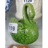 A 4" Watcombe green glazed pottery swan - minor chip to wing