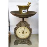 A pair of Salter's Household Scales No. 49 - sold with a small brass pestle and mortar