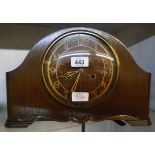 A mid 20th Century polished oak cased mantel clock with Enfield eight day chiming movement