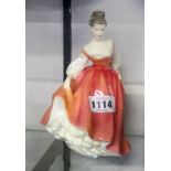 A Royal Doulton "Fair Lady" figurine HN 2835 (coral pink)