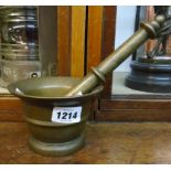 A turned bronze mortar and associated bell metal pestle