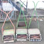Three 20th Century push along lawn mowers, all by Qualcast, two with grass boxes - various