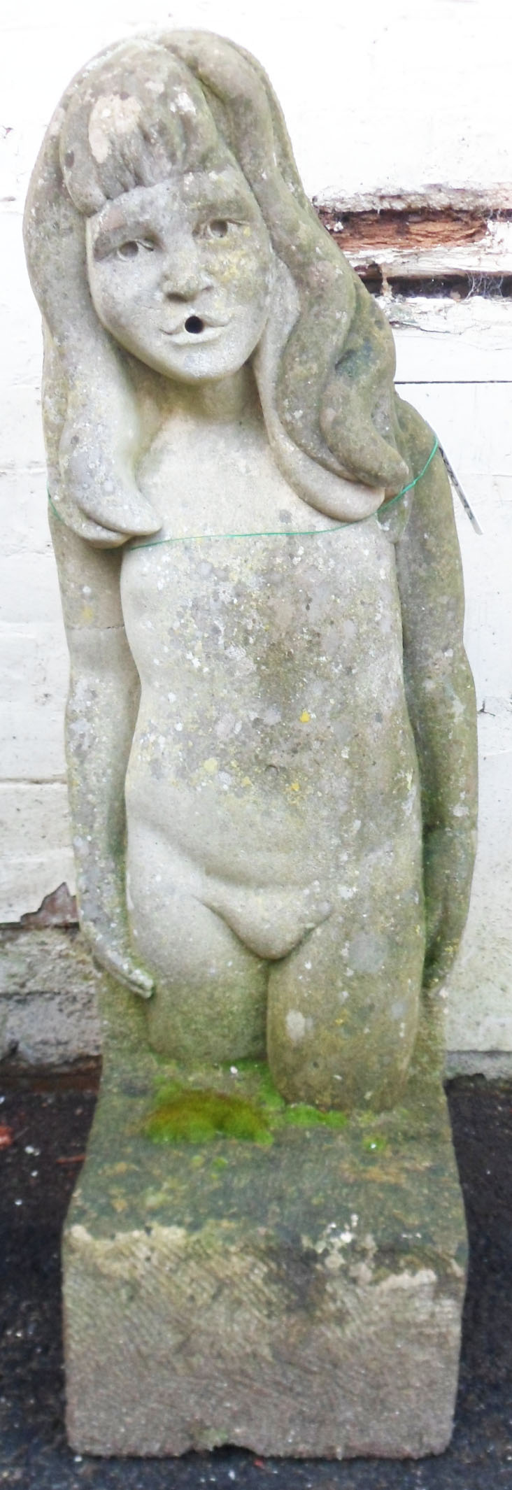 A 3' 4" early 20th Century garden fountain in the form of a young girl on a plinth base