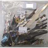 A bag containing a quantity of assorted clock hands