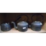 A Swain cast iron 2 Pint pan with lid, a Swain 4 Pint kettle, and a L.M.S. cast kettle