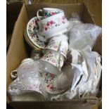A Windsor bone china six place tea set with floral decoration - one saucer missing