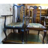 A 19th Century Queen Anne style elbow chair with tapestry panel drop-in seat, set on cabriole