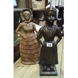 Two metal companion stands, one in the style of a Dutch woman and the other a Victorian lady -