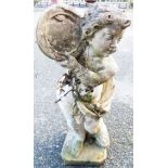 A 28" pre-cast garden statue of a putto playing a tambourine