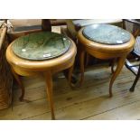 A pair of 18" diameter continental stained walnut and green marble topped occasional tables, set