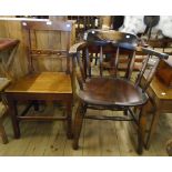 An elm seated smoker's bow elbow chair (a/f) - sold with a 19th Century oak framed hall chair