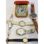 A quantity of watches - sold with a travelling alarm clock