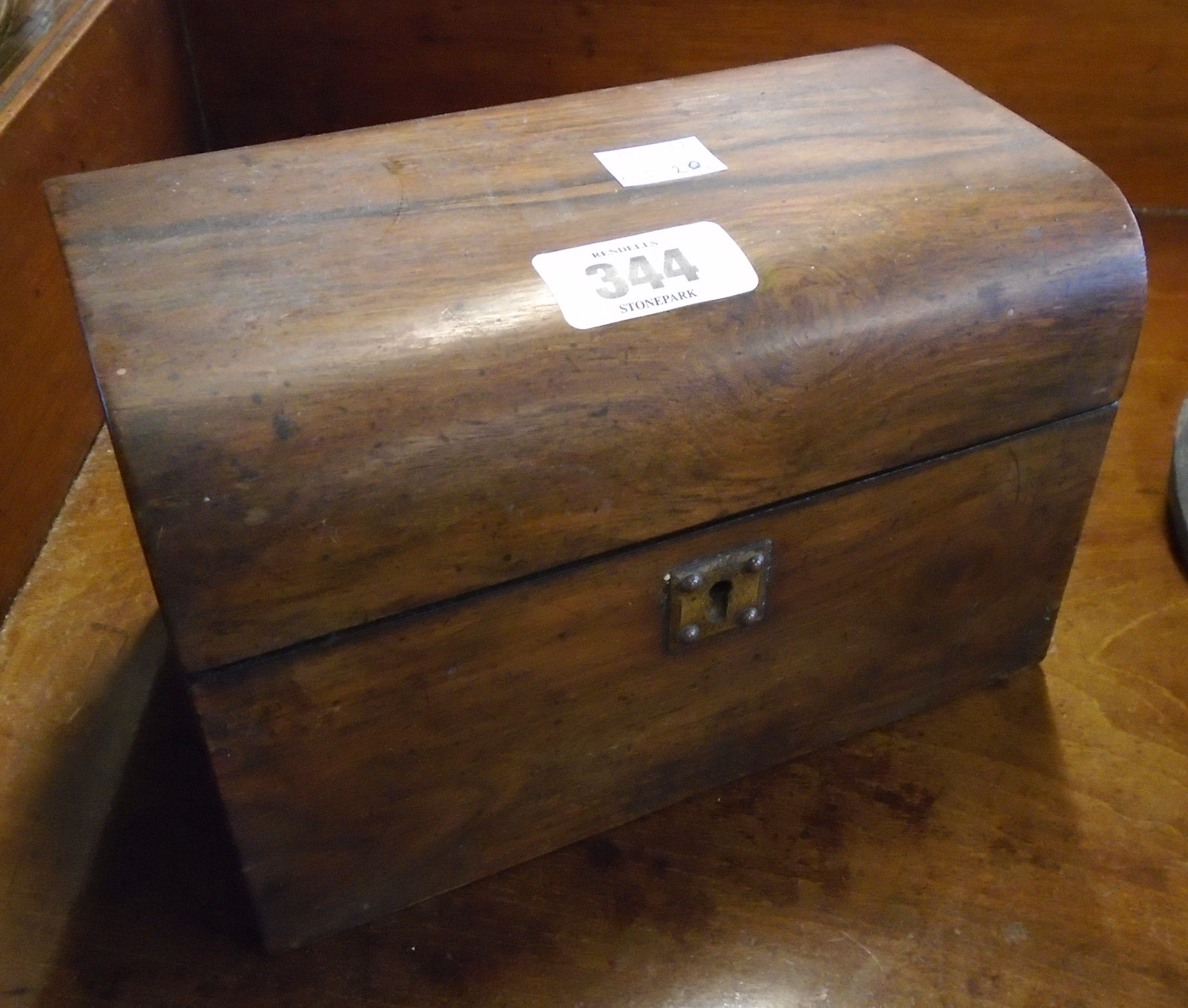 An 8" Victorian rosewood dome top twin compartment tea caddy