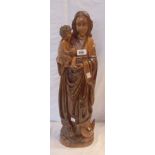 A 24" continental carved wood figure of the Madonna and Child