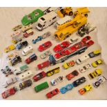 A box containing a collection of vintage and later Matchbox and other toy cars including "Super