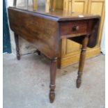 A 3' 7" Victorian mahogany Pembroke table with single drawer, set on turned legs