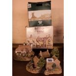 Two boxed Lilliput Lane models, The Periwinkle Cottage (in the Star Inn box) and Bluebell Farm