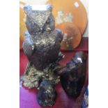 A Bretby black cat with glass eyes - paint loss - sold with a plaster model of a horse and another