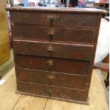 A 12 1/2" Victorian stained wood and pokerwork decorated specimen chest with flight of six