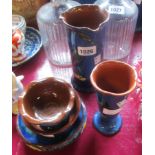 Five pieces of Torquay Pottery kingfisher ware comprising two vases, two bowls and a pedestal bowl