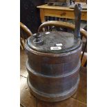 An 11 1/2" diameter 19th Century coopered churn with integral handle and knob to lid