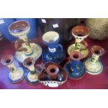Eight various Watcombe and Longpark Potteries candle and chambersticks including kingfisher,