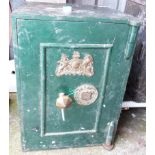 A late Victorian painted cast iron safe with embossed brass royal coat of arms to door - no key