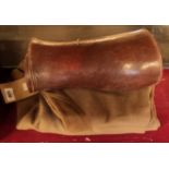 A pair of whipcord breeches and a pair of brown leather gaiters