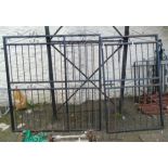 A pair of 6' 2" high painted wrought iron gates in two widths - to fit 10' 6" aperture - sold with a