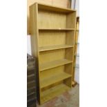 A 36" solid oak five shelf open bookcase