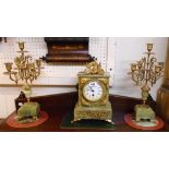 A late 19th Century gilt metal mounted green onyx clock garniture, the eight day timepiece set