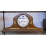 An Edwardian inlaid mahogany cased mantel timepiece with eight day movement