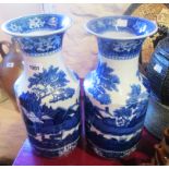 A pair of 14" Wedgwood Fallow Deer pattern blue and white baluster vases