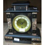 A late Victorian black slate and marble cased mantle timepiece with HAC movement