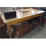 A 6' polished pine farmhouse kitchen table with single drawer to one end, set on animal damaged