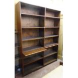 A 5' 2" stained mixed wood open bookcase unit, comprising six flanking open shelves and two pull-out