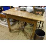 A 4' 5" French waxed pine preparation table with sliding top opening to reveal a well interior,