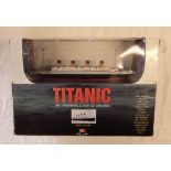 A boxed Clayton Collection diecast 1/1136 scale model of the Titanic, with certificate