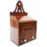 A late Georgian mahogany and strung wall mounted sloped lift top candle box with pierced suspender